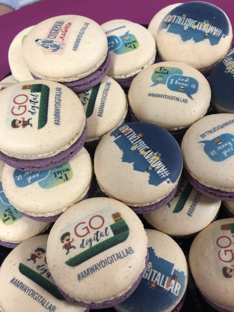 Macarons with the Amway Digital Lab logo at a program launch.